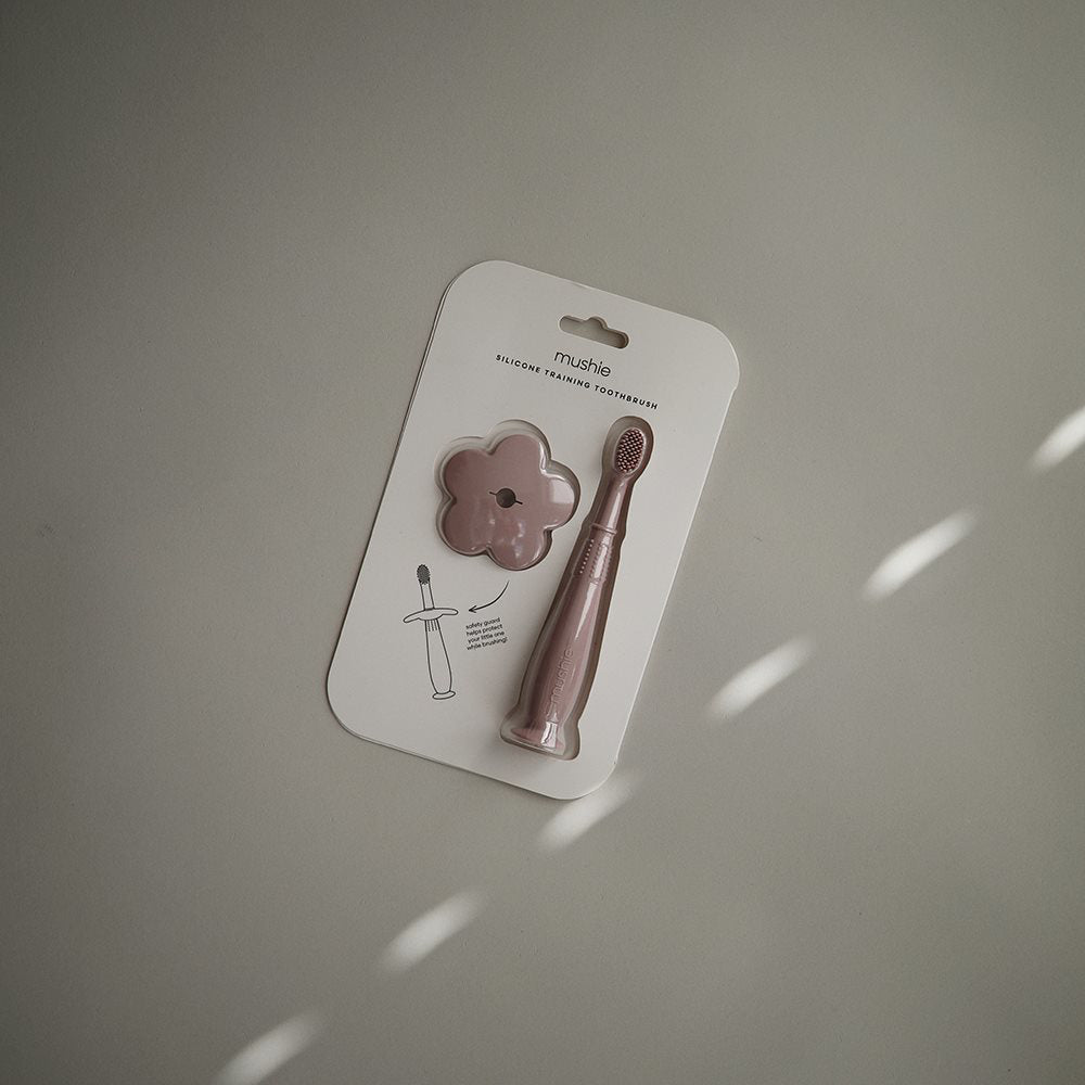 Mushie® Silikonska zobna ščetka Soft Lilac Mushie