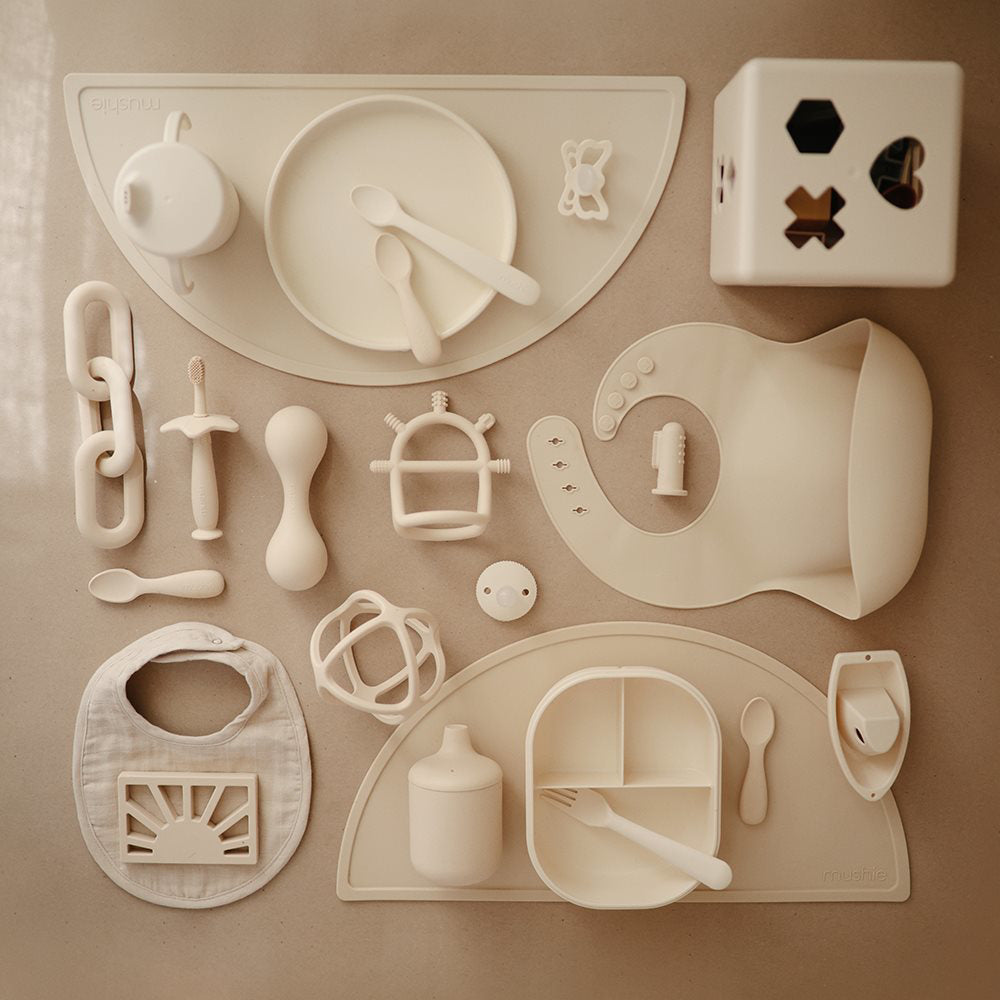 Mushie® Senzorično grizalo No-Drop Shifting Sand Mushie