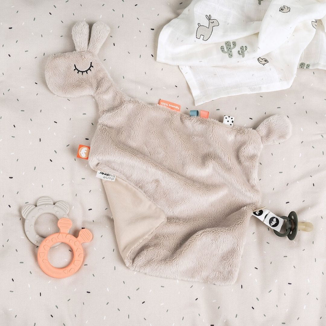 Done by Deer® Ninica s priponko Lalee Sand Done by Deer